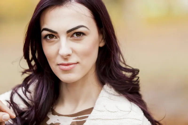Attractive woman posing for beauty portrait outdoo