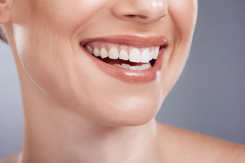Bright smile with healthy teeth and glossy lips