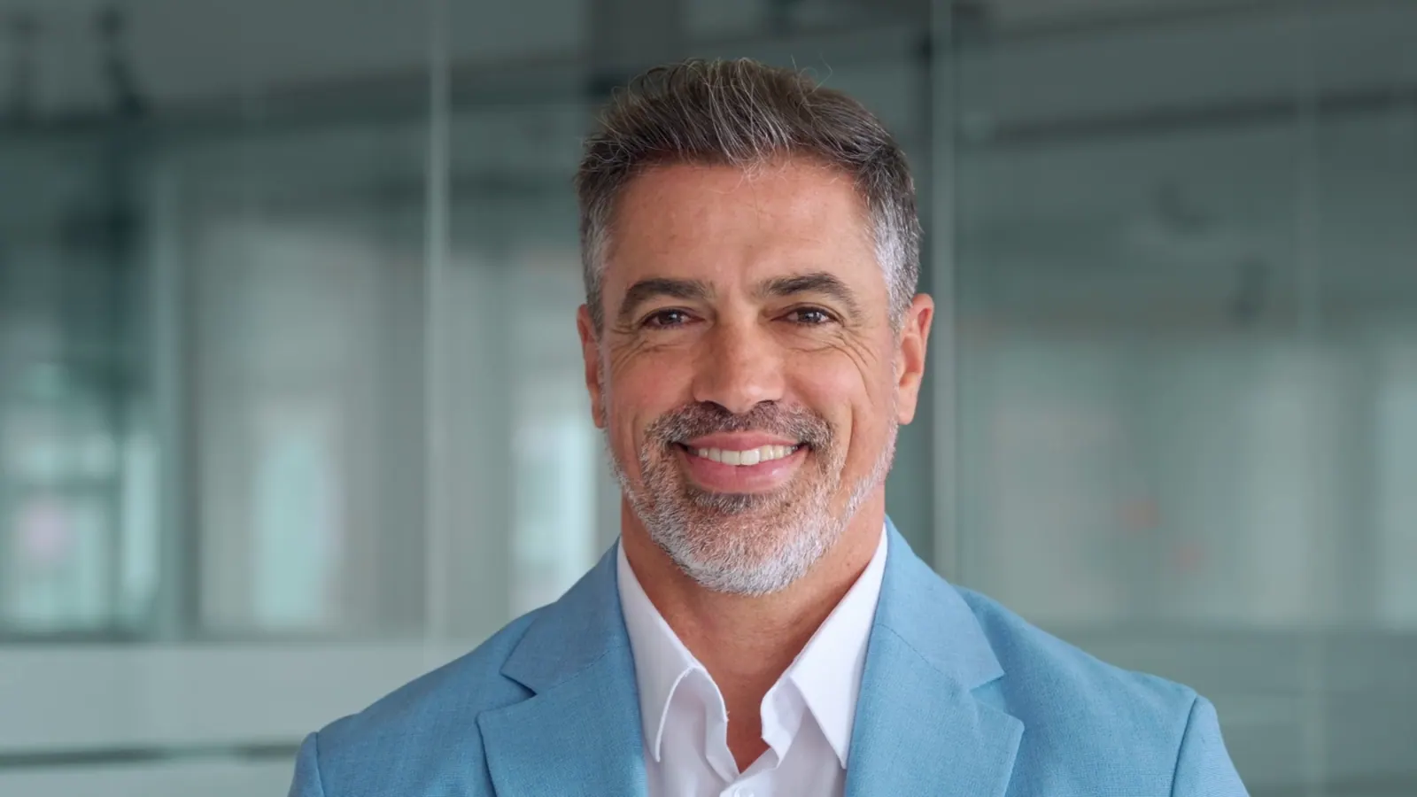 Confident man smiling in a corporate setting