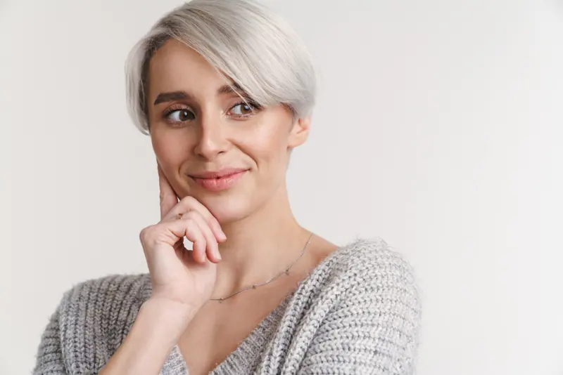 Happy beautiful silver girl smiling and looking as
