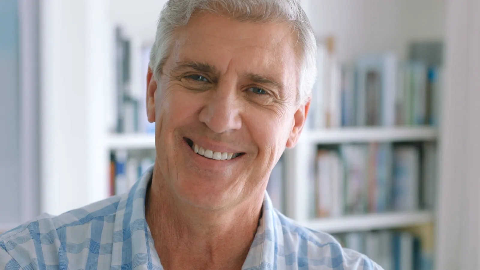Smiling adult man close up portrait indoors