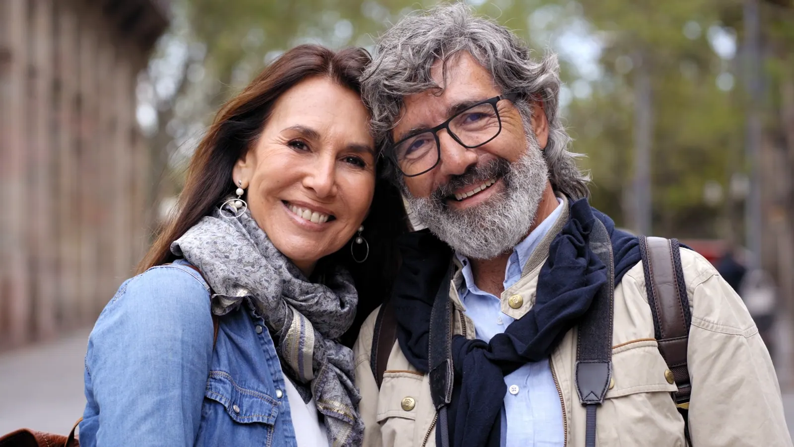 Smiling couple enjoying city travel together