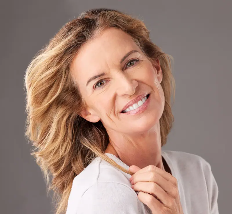 Smiling woman in portrait with flowing hair